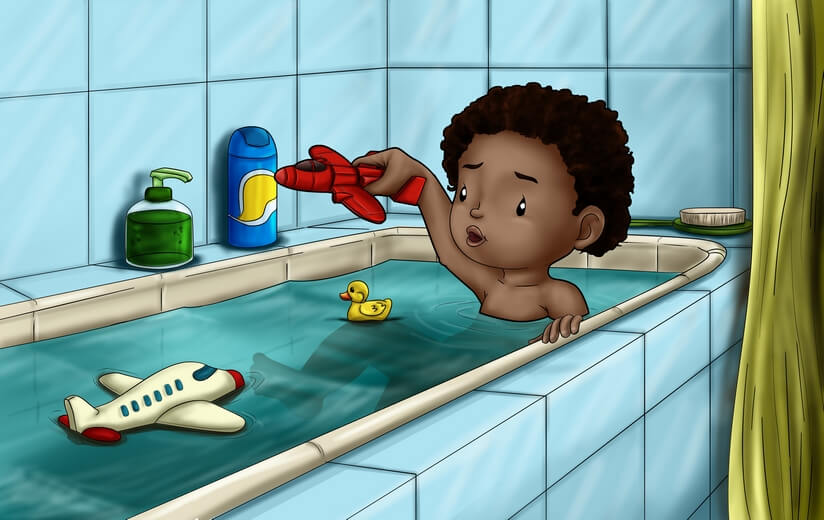 A boy playing with his toy plane in the bath.