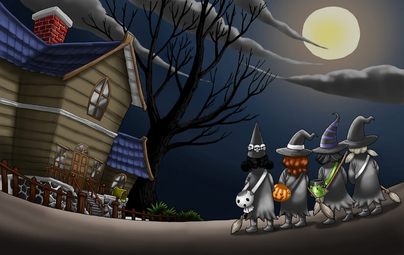 Four girls in witch costumes standing in front of a scary-looking house.