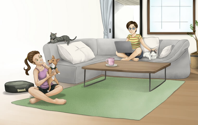 A dog and two cats and their human owners in a comfortable living room.